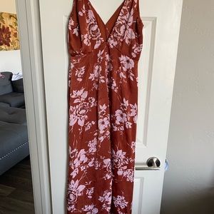 Beautiful ankle length, thin strap, button at the chest dress.